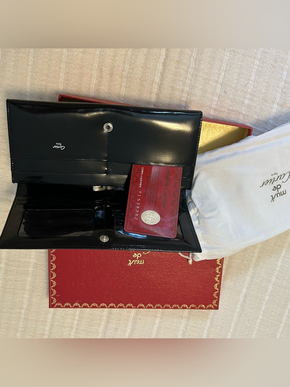Cartier Black Patent Leather Men's Wallet with Red Certificate Card